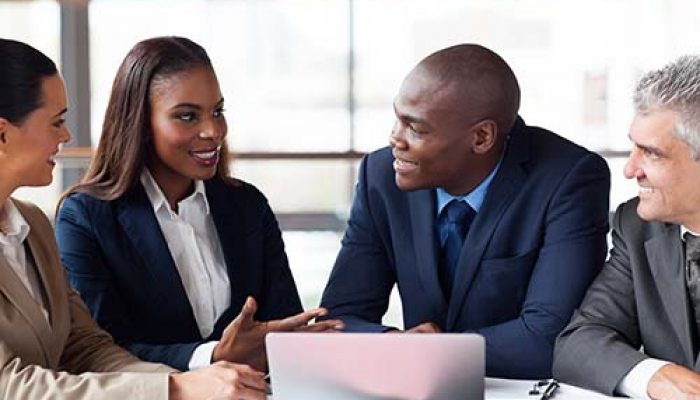 group of successful business people having meeting together